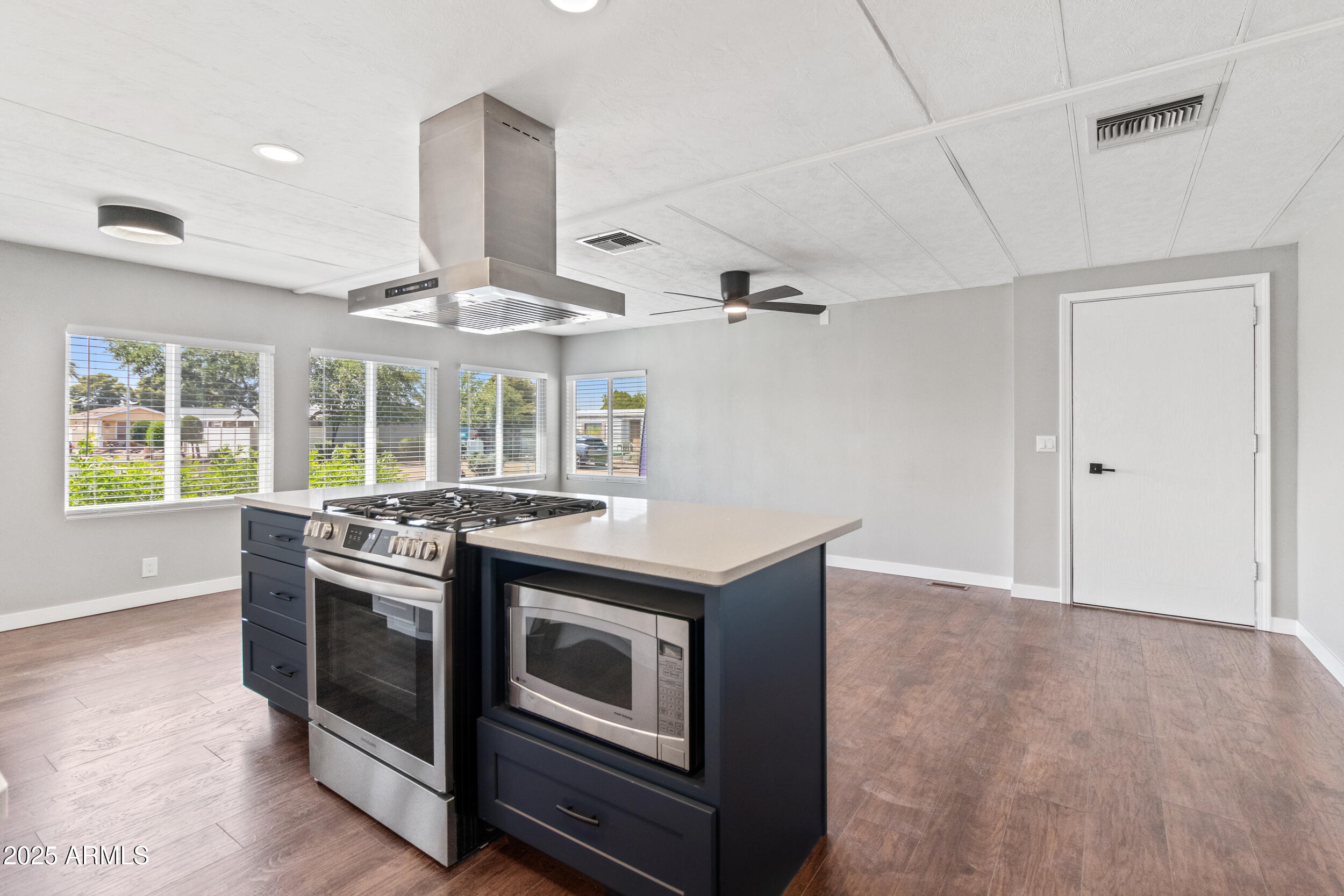 2401 West Southern Avenue, Unit 224 Tempe, AZ 85282 - Photo 2 of 47 a kitchen with stainless steel appliances granite countertop a stove and a refrigerator