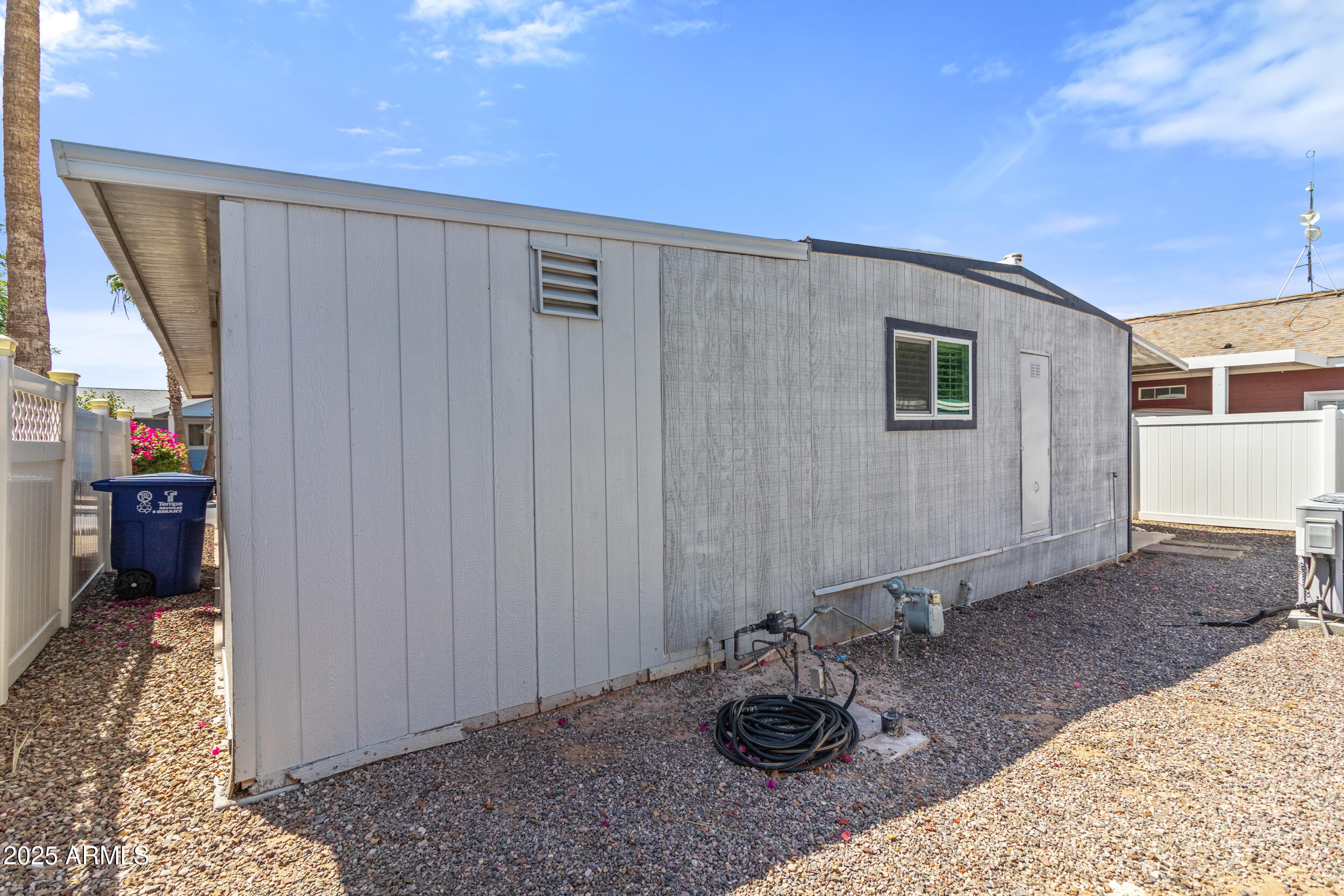 2401 West Southern Avenue, Unit 224 Tempe, AZ 85282 - Photo 28 of 47 a room with furniture and a rug