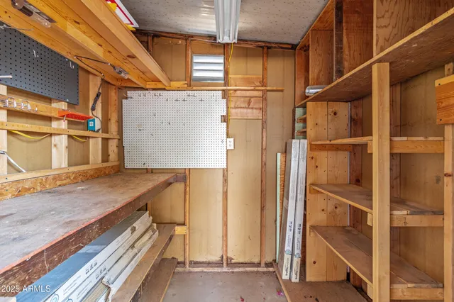 a view of a balcony with wooden floor