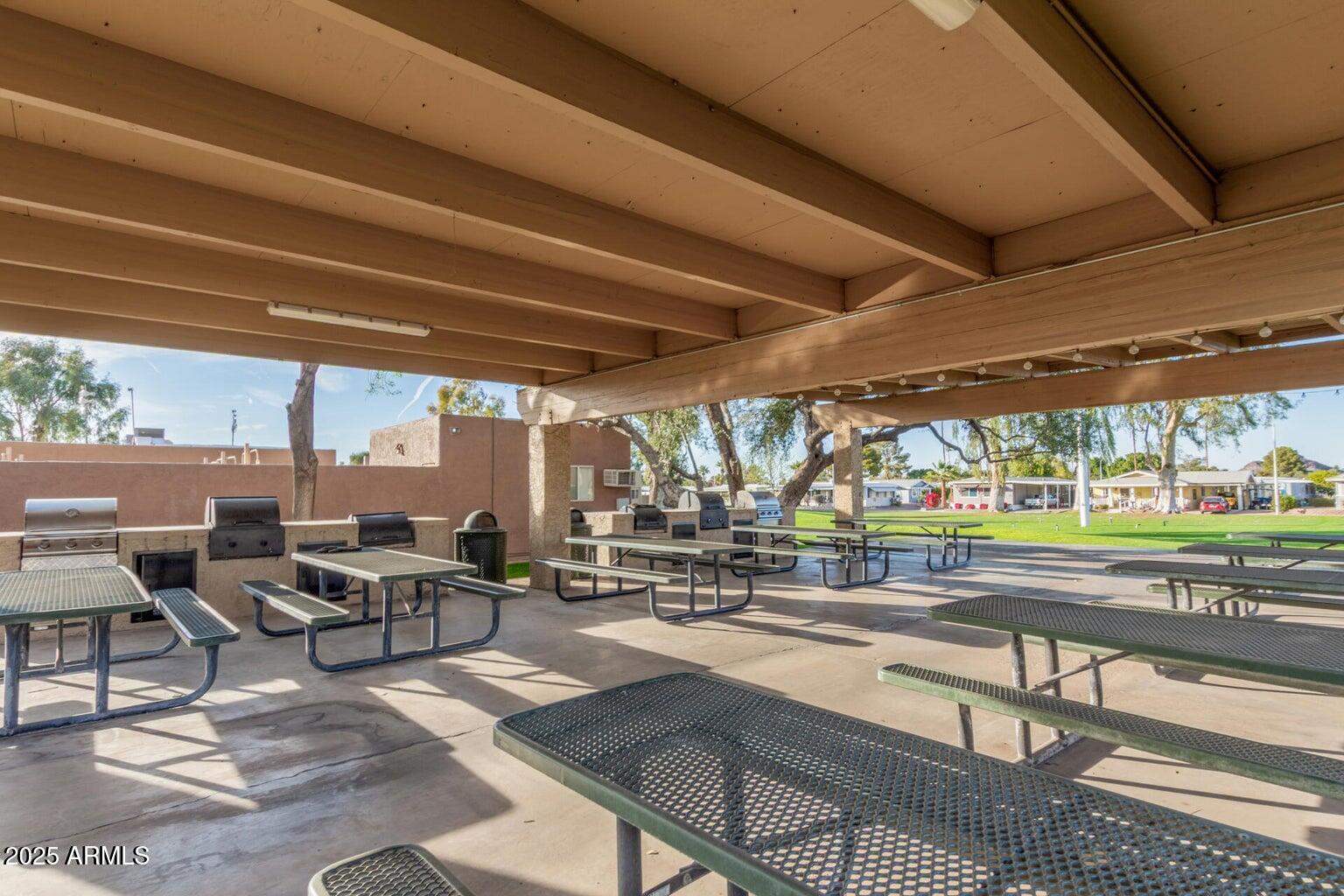 2401 West Southern Avenue, Unit 224 Tempe, AZ 85282 - Photo 31 of 47 a living room with lots of table and chairs