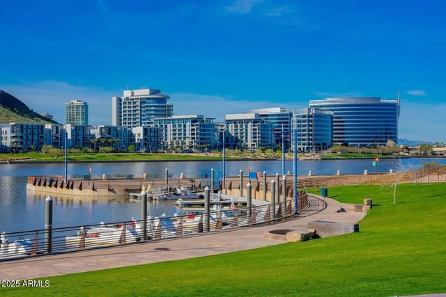 a view of a lake with a building and outdoor view