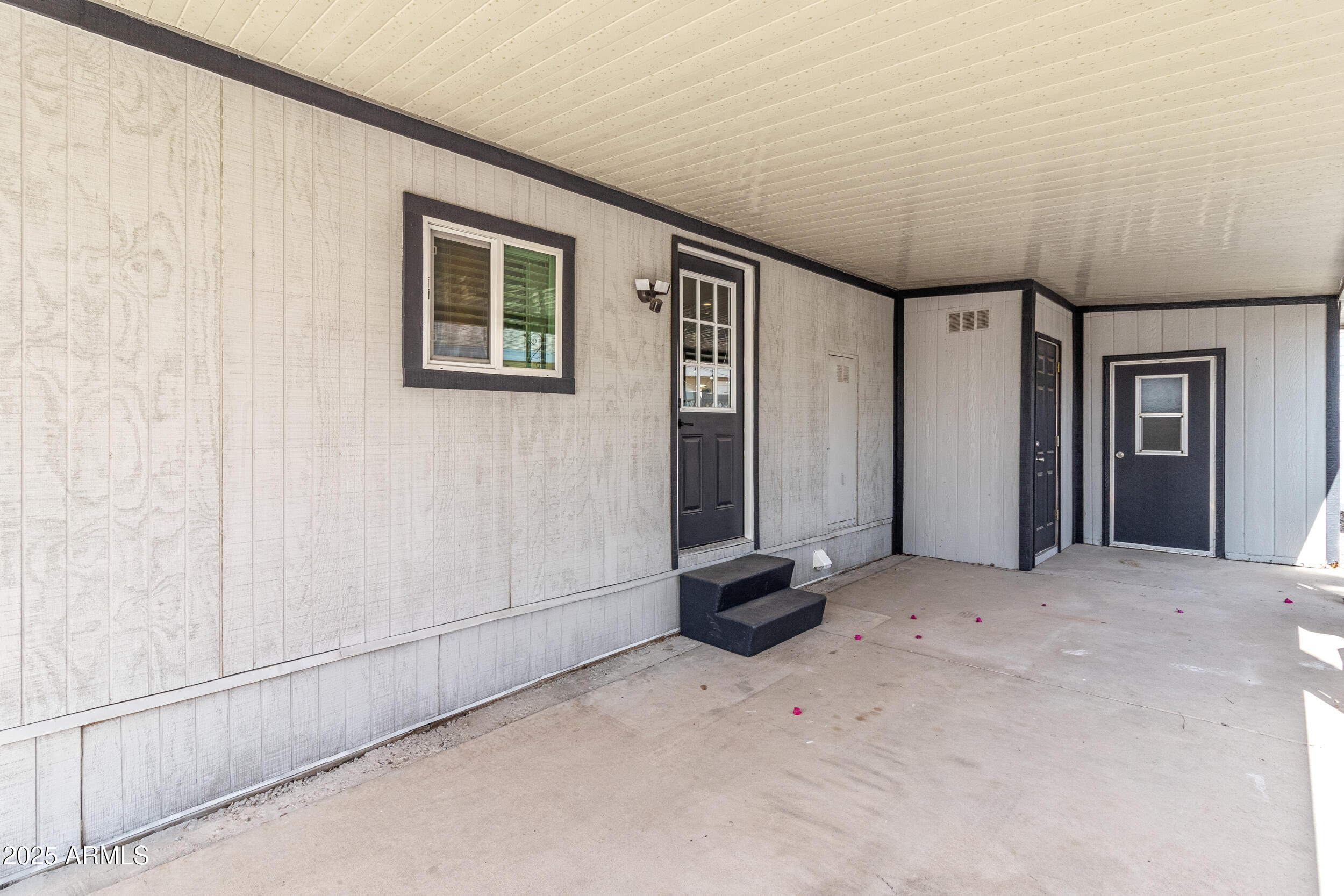 2401 West Southern Avenue, Unit 224 Tempe, AZ 85282 - Photo 9 of 47 a view of a livingroom with an empty space