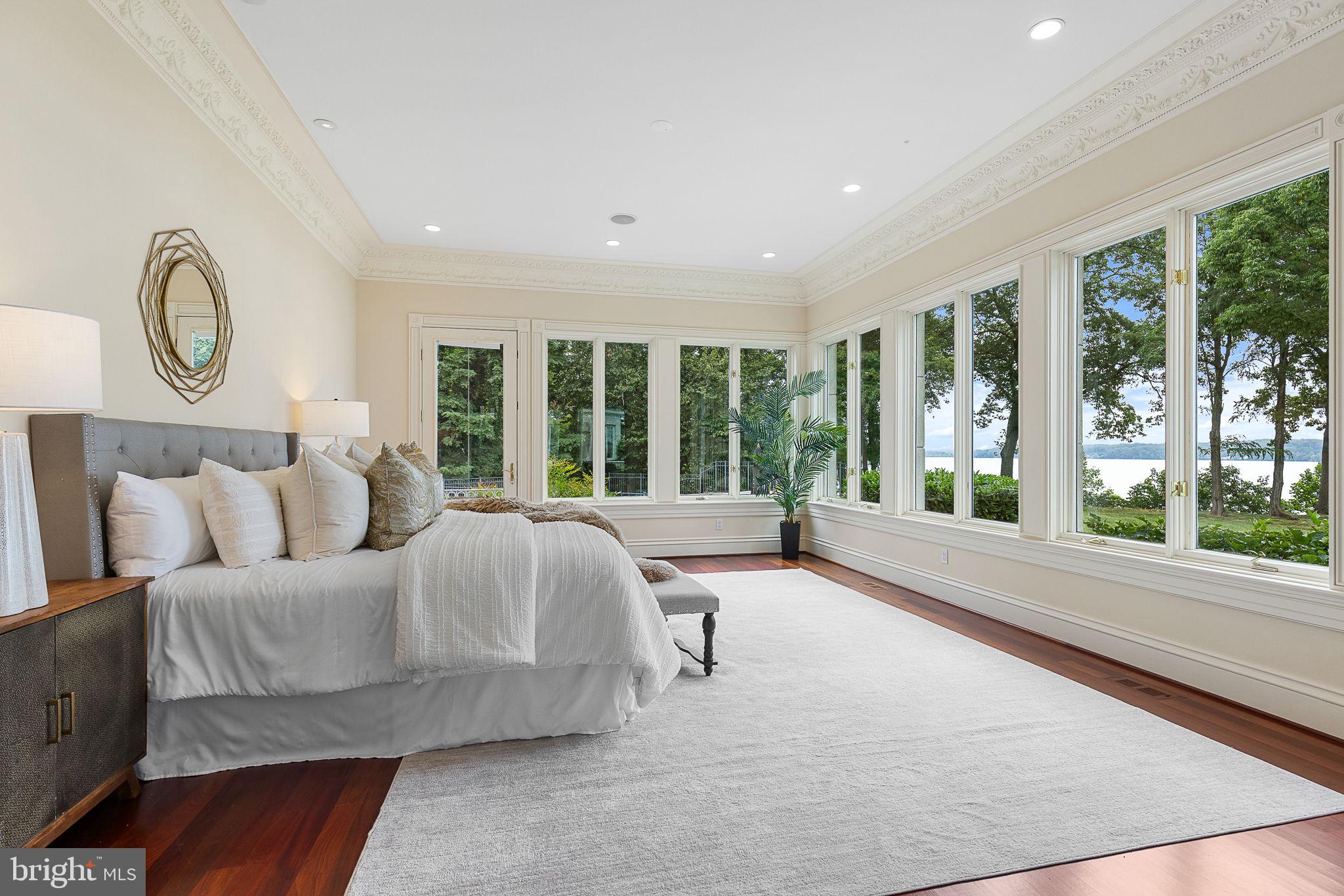 11195 Gunston Road Lorton, VA 22079 - Photo 14 of 118 Luxurious primary suite with stunning river views