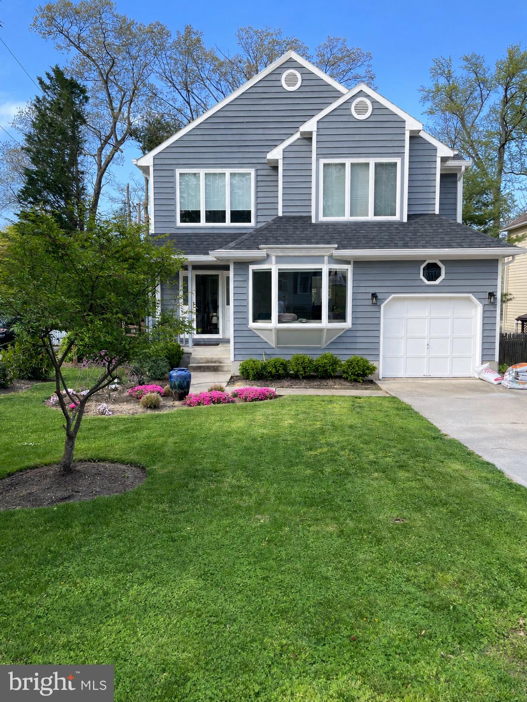 108 Spot Club Road Arnold, MD 21012 - Photo 1 of 30 Charming blue home with vibrant garden.