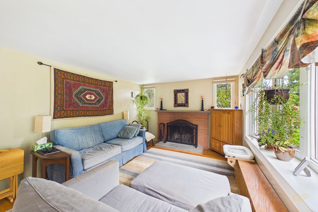 70 Neponset Street Canton, MA 02021 - Photo 6 of 39 a living room with furniture and a fireplace