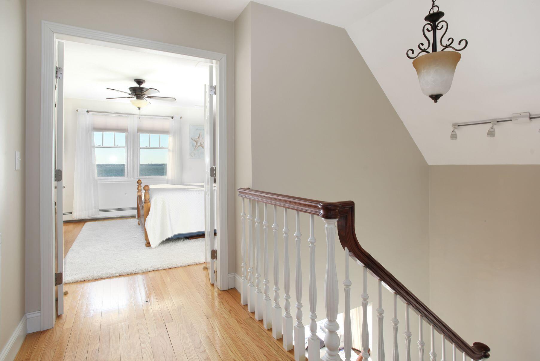 1 Calumet Road Fairhaven, MA 02719 - Photo 17 of 30 a view of a hallway view with wooden floor and staircase