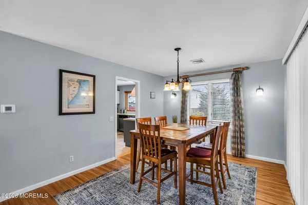a view of a dining room with furniture