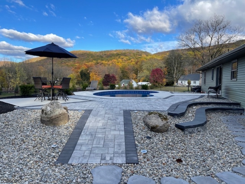 4435 Rudetown Road Hamburg, NJ 07419 - Photo 6 of 24 a view of a backyard with sitting area