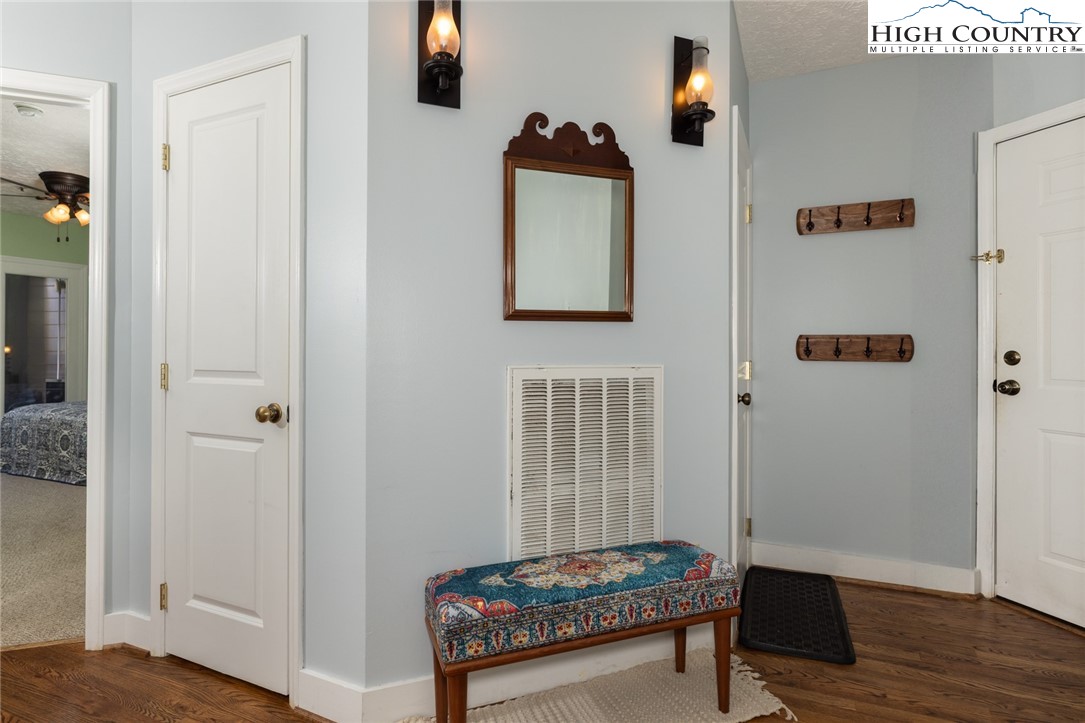446 Peaceful Haven Drive, Unit 811 Boone, NC 28607 - Photo 11 of 19 a living room with furniture and a table