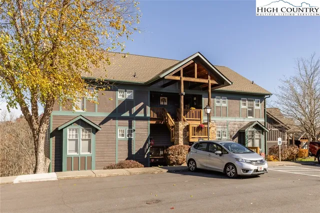 a car parked in front of a house