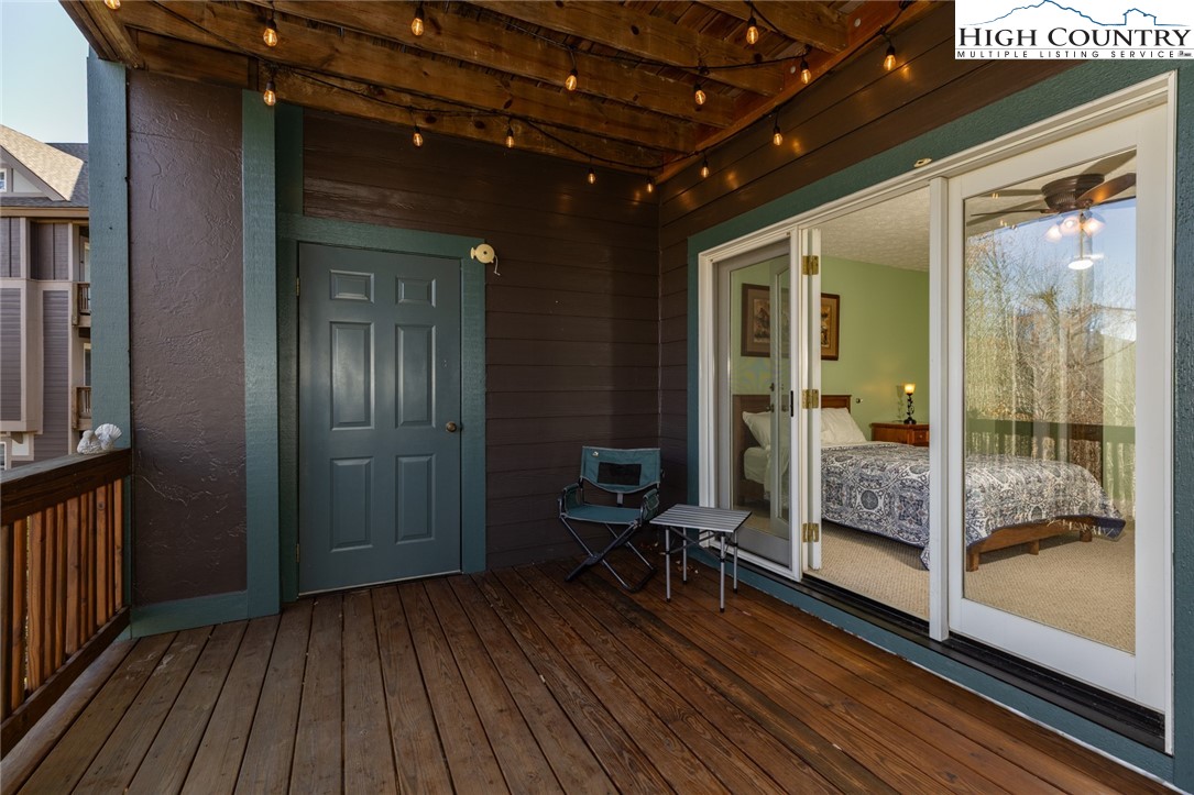446 Peaceful Haven Drive, Unit 811 Boone, NC 28607 - Photo 5 of 19 a view of a balcony with wooden floor