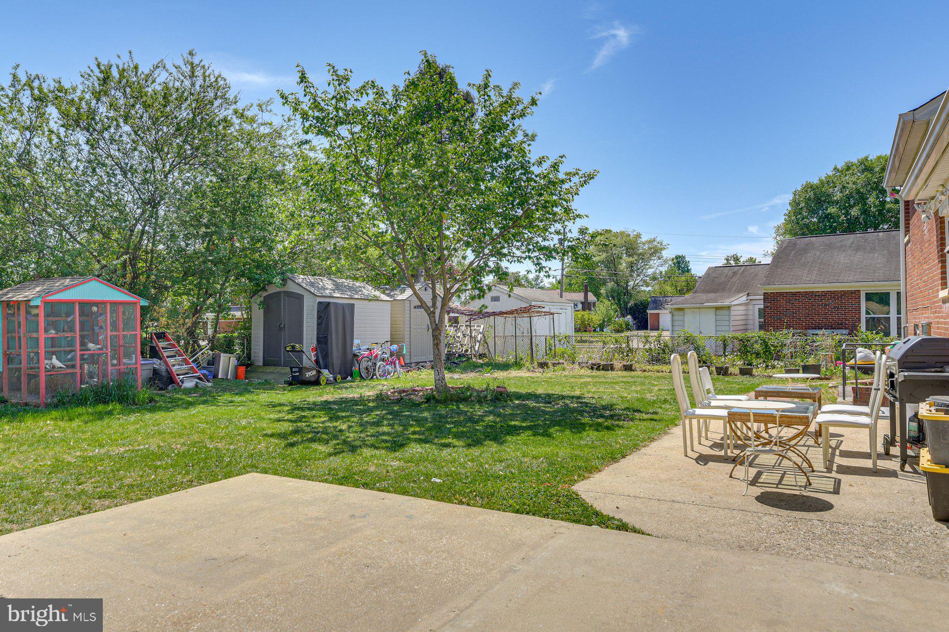 5929 Camberly Avenue Springfield, VA 22150 - Photo 20 of 24 a view of a backyard with sitting area