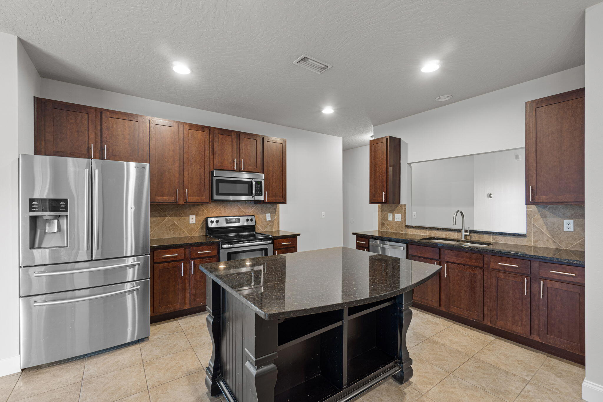 Granite countertops, solid cabinets