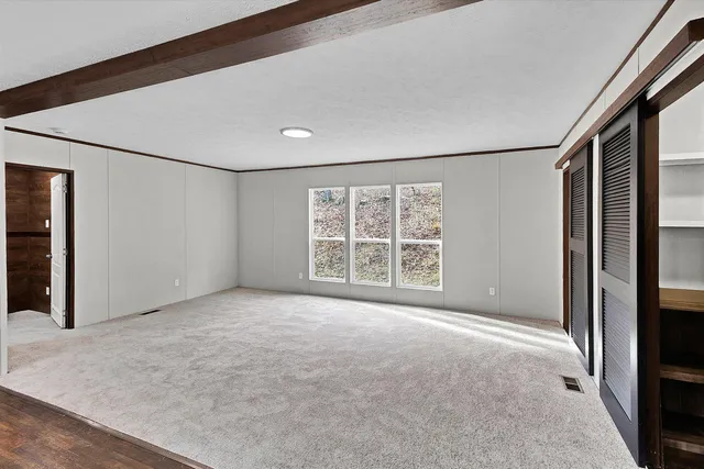 an empty room with windows