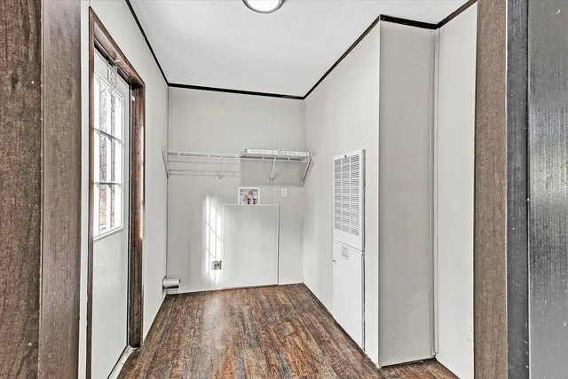 a view of a bathroom from a hallway