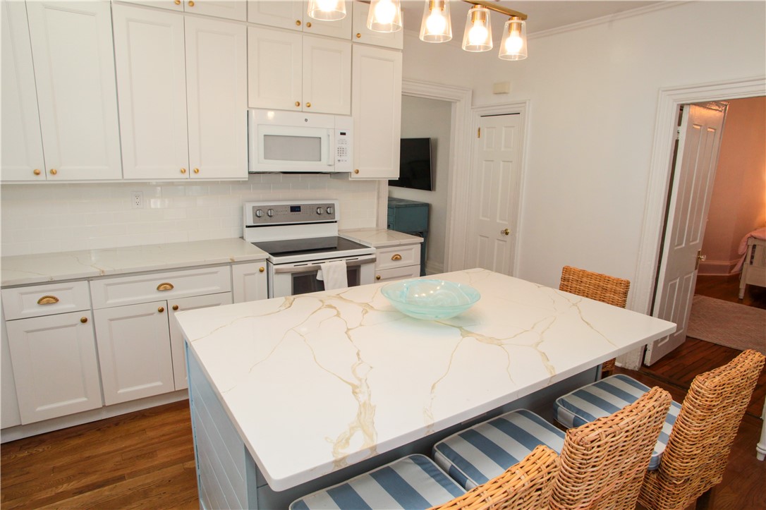 42 Mann Avenue Newport, RI 02840 - Photo 11 of 43 Quartz countertops and plenty of cabinet space