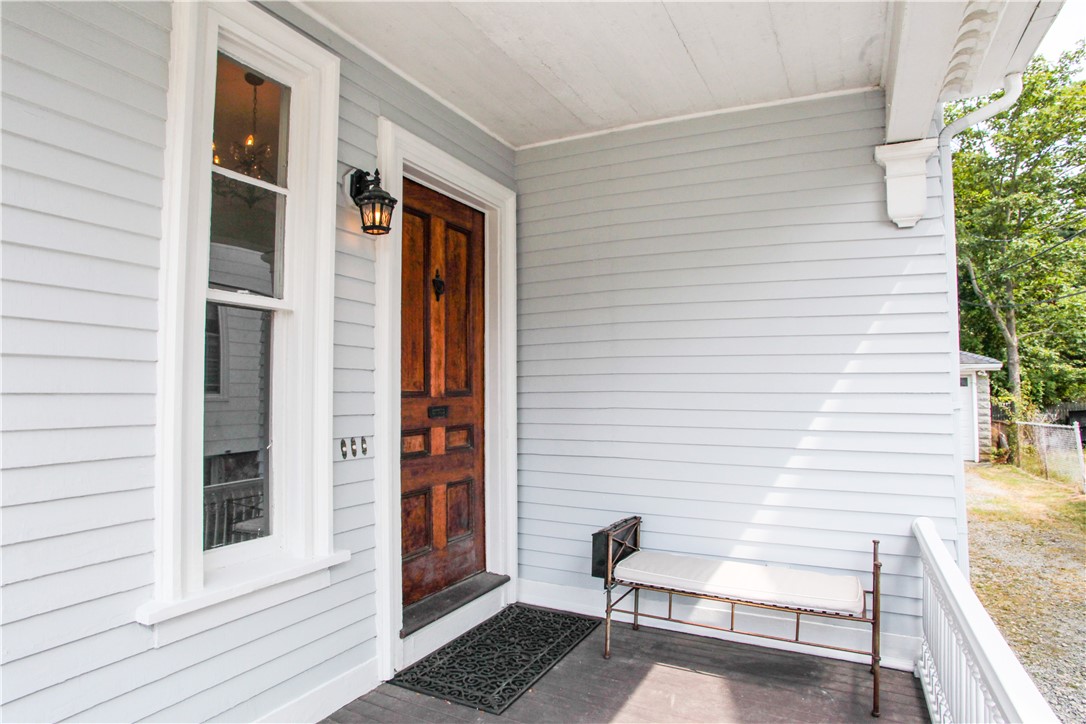 42 Mann Avenue Newport, RI 02840 - Photo 2 of 43 Original Hardwood Front door and quaint porch welcome you into the foyer