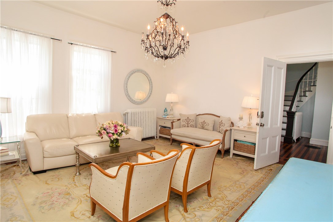 42 Mann Avenue Newport, RI 02840 - Photo 3 of 43 High Ceilings and hardwood flooring lend an air of elegance to Unit 1