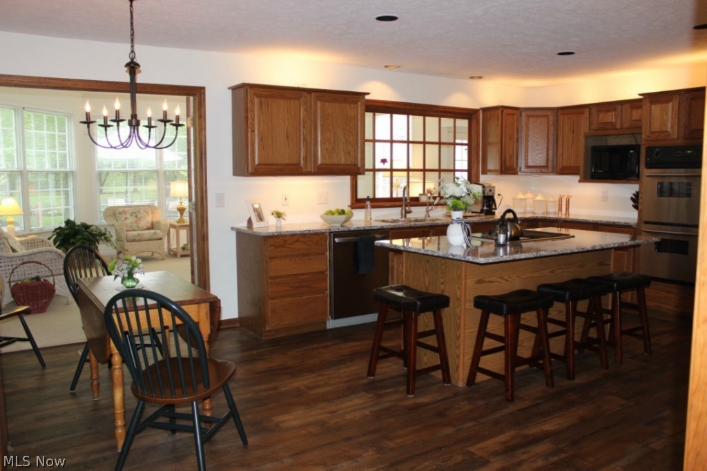 View of Kitchen and Sunroom