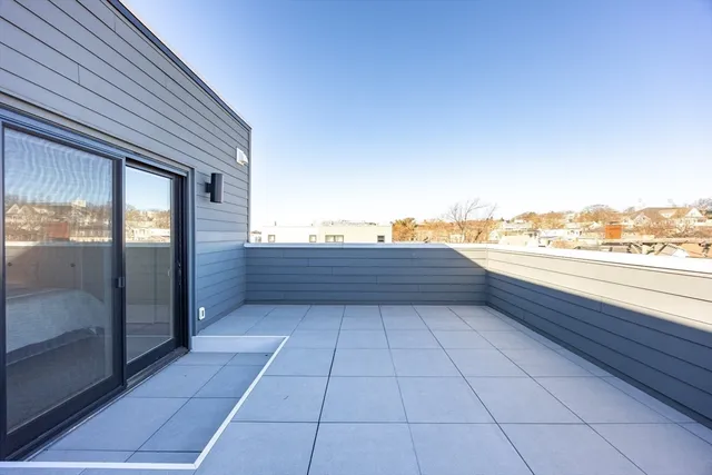 a bathroom with a toilet sink and shower