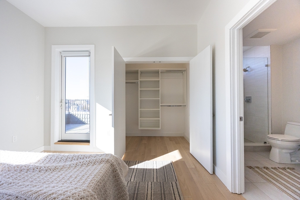 1 Loring Street, Unit 3 Somerville, MA 02143 - Photo 20 of 39 a bedroom with a bed and a window