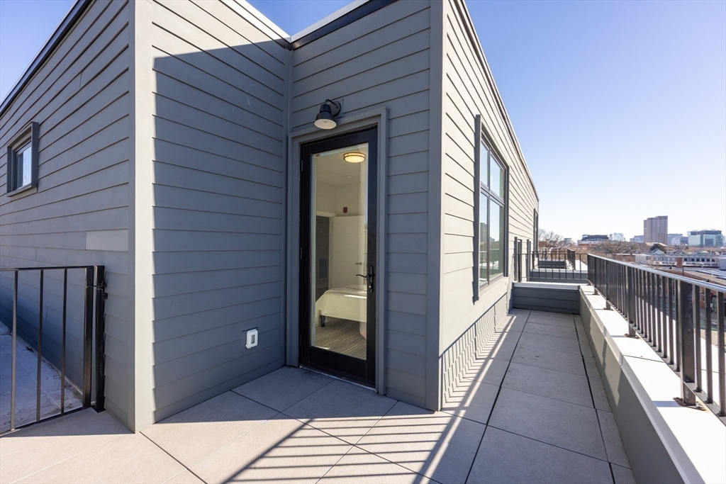 1 Loring Street, Unit 3 Somerville, MA 02143 - Photo 23 of 39 a view of a balcony
