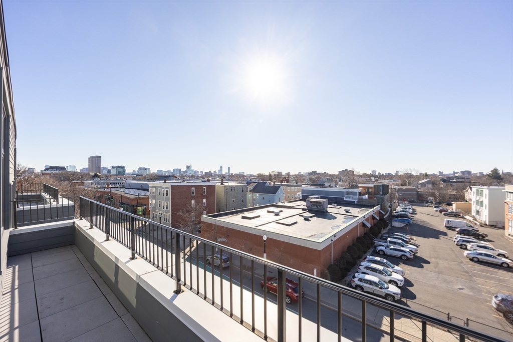 1 Loring Street, Unit 3 Somerville, MA 02143 - Photo 24 of 39 a view of a balcony with city view