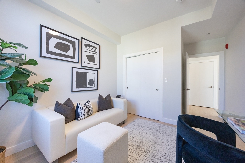 1 Loring Street, Unit 3 Somerville, MA 02143 - Photo 28 of 39 a living room with furniture and window
