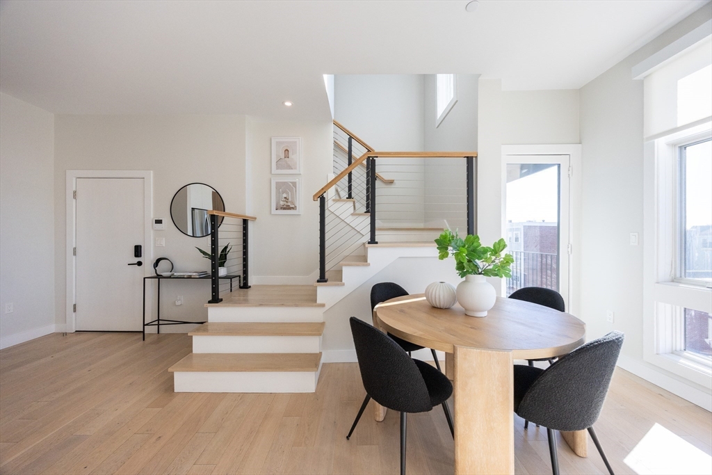 1 Loring Street, Unit 3 Somerville, MA 02143 - Photo 6 of 39 a living room with furniture