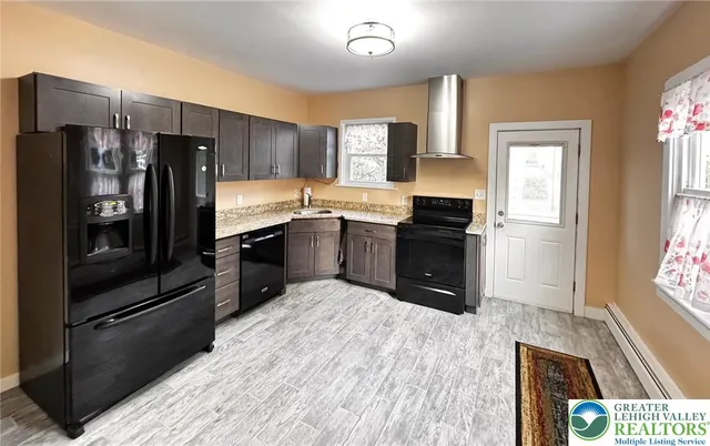 a bedroom with a bed and a mirror