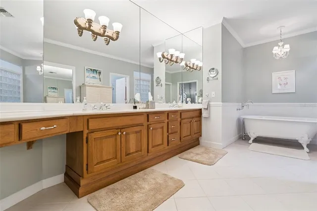 a bathroom with a sink toilet and mirror