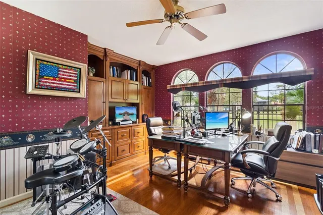 a view of a livingroom with furniture and staircase