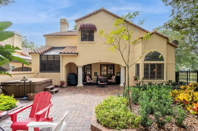 a view of a park with large trees