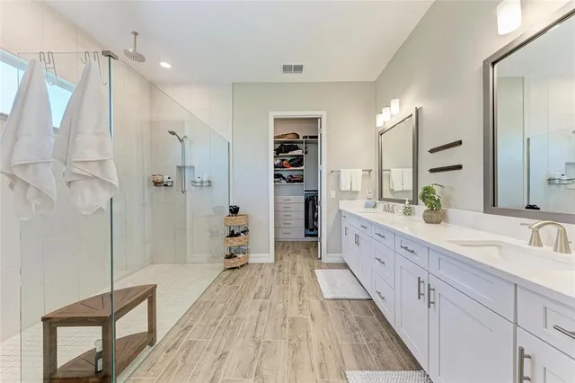 a view of sign board with flower around