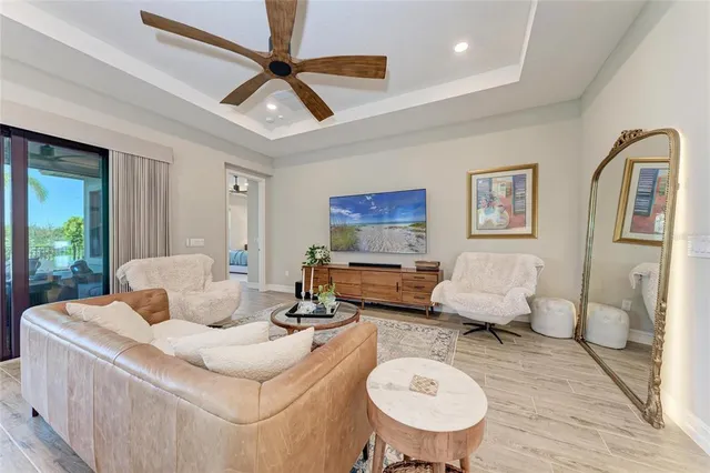 a large kitchen with a table and chairs