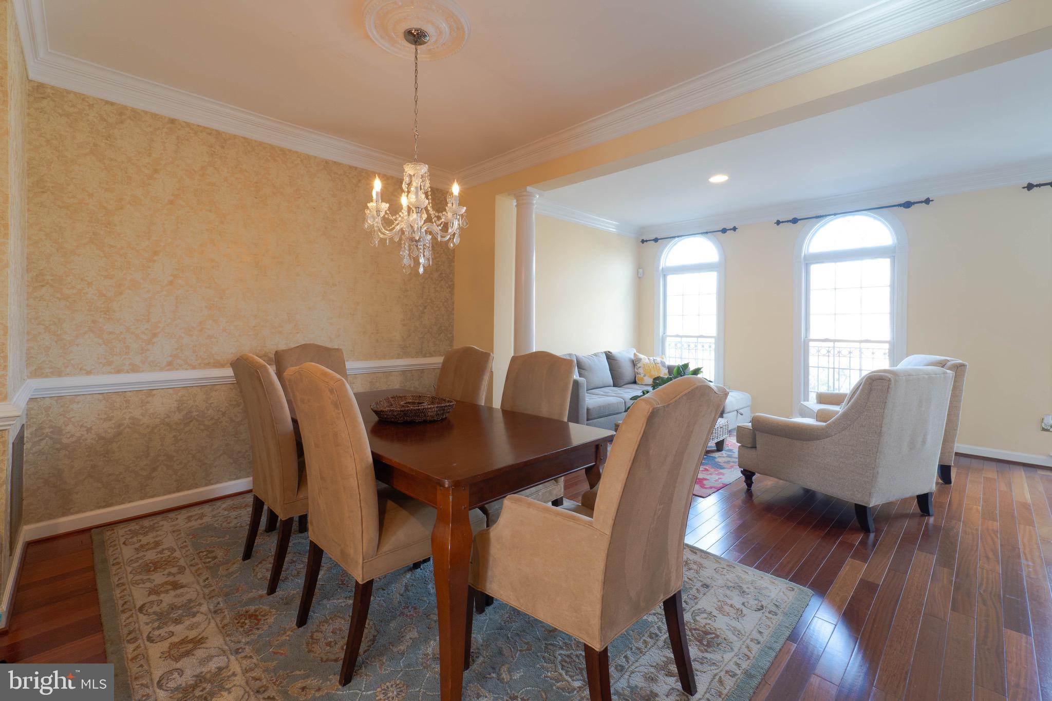 11453 Galliec Street, Unit 40 Fairfax, VA 22030 - Photo 22 of 45 a view of a dining room with furniture and wooden floor