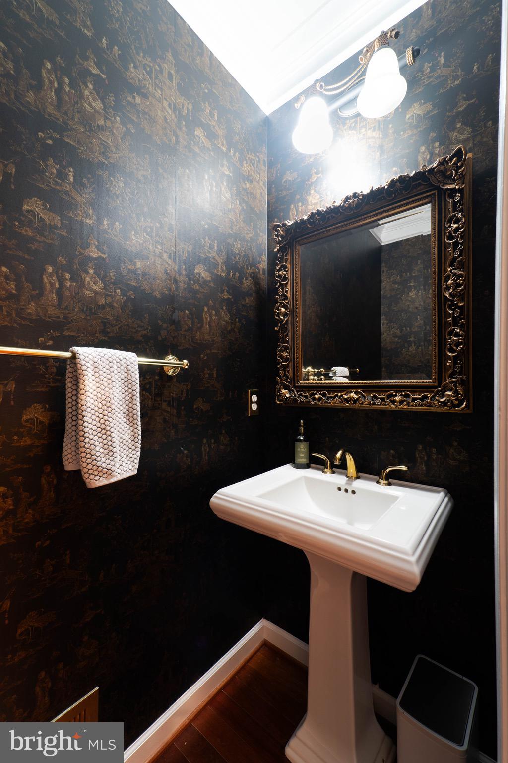 11453 Galliec Street, Unit 40 Fairfax, VA 22030 - Photo 27 of 45 a bathroom with a sink and a mirror