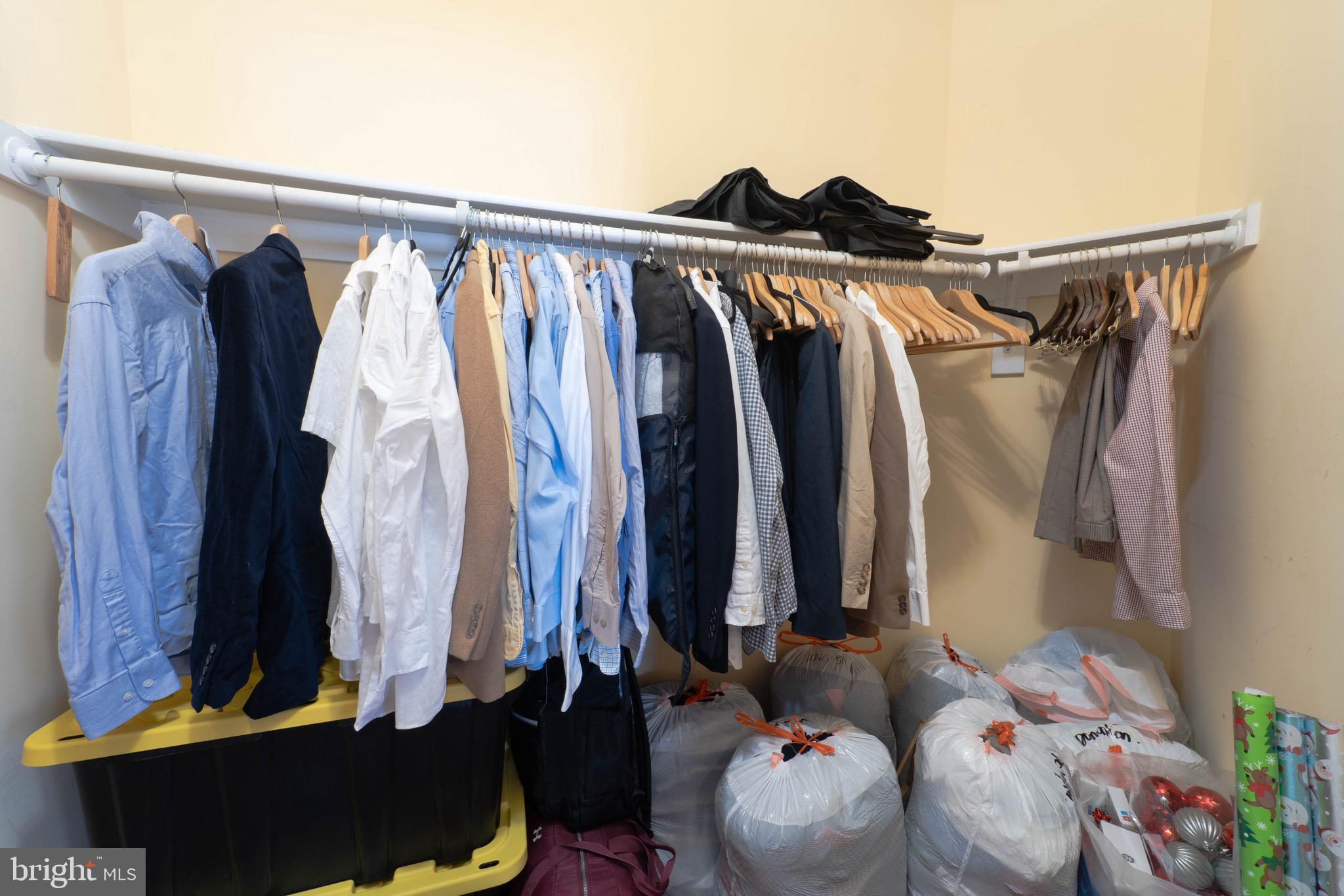 11453 Galliec Street, Unit 40 Fairfax, VA 22030 - Photo 33 of 45 a view of walk in closet with clothes