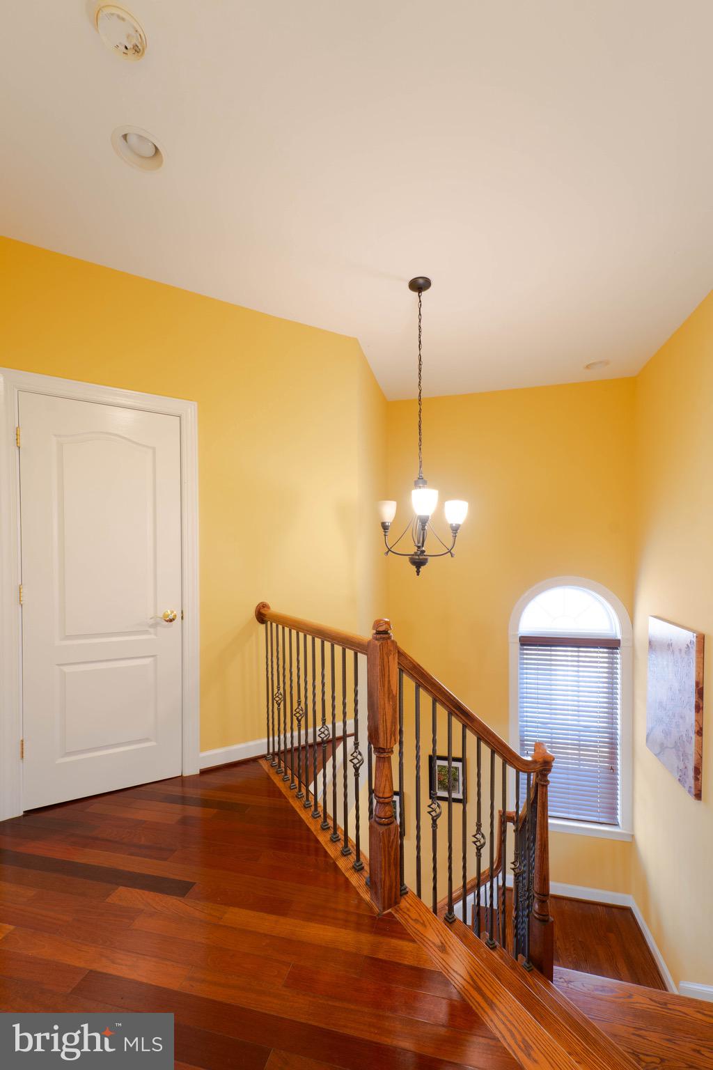11453 Galliec Street, Unit 40 Fairfax, VA 22030 - Photo 43 of 45 a view of a room with wooden floor and fan