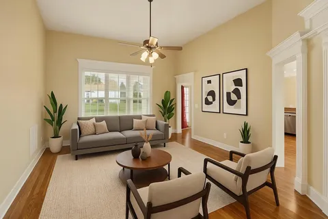 a large kitchen with granite countertop a large counter top space and stainless steel appliances