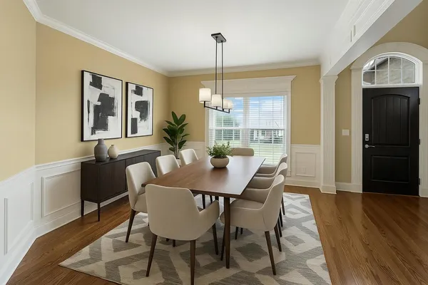 a kitchen with stainless steel appliances kitchen island granite countertop a refrigerator a stove and a sink with wooden floor