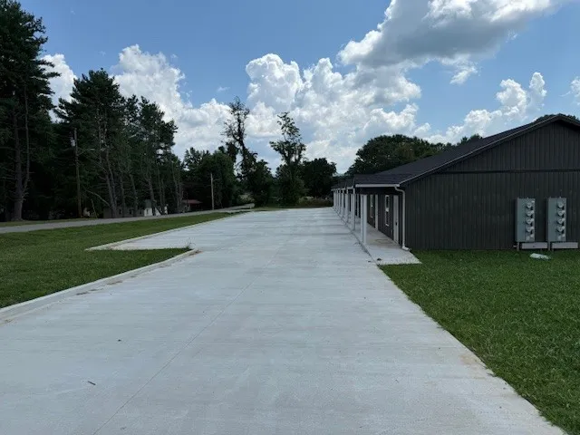 a view of a backyard of the house