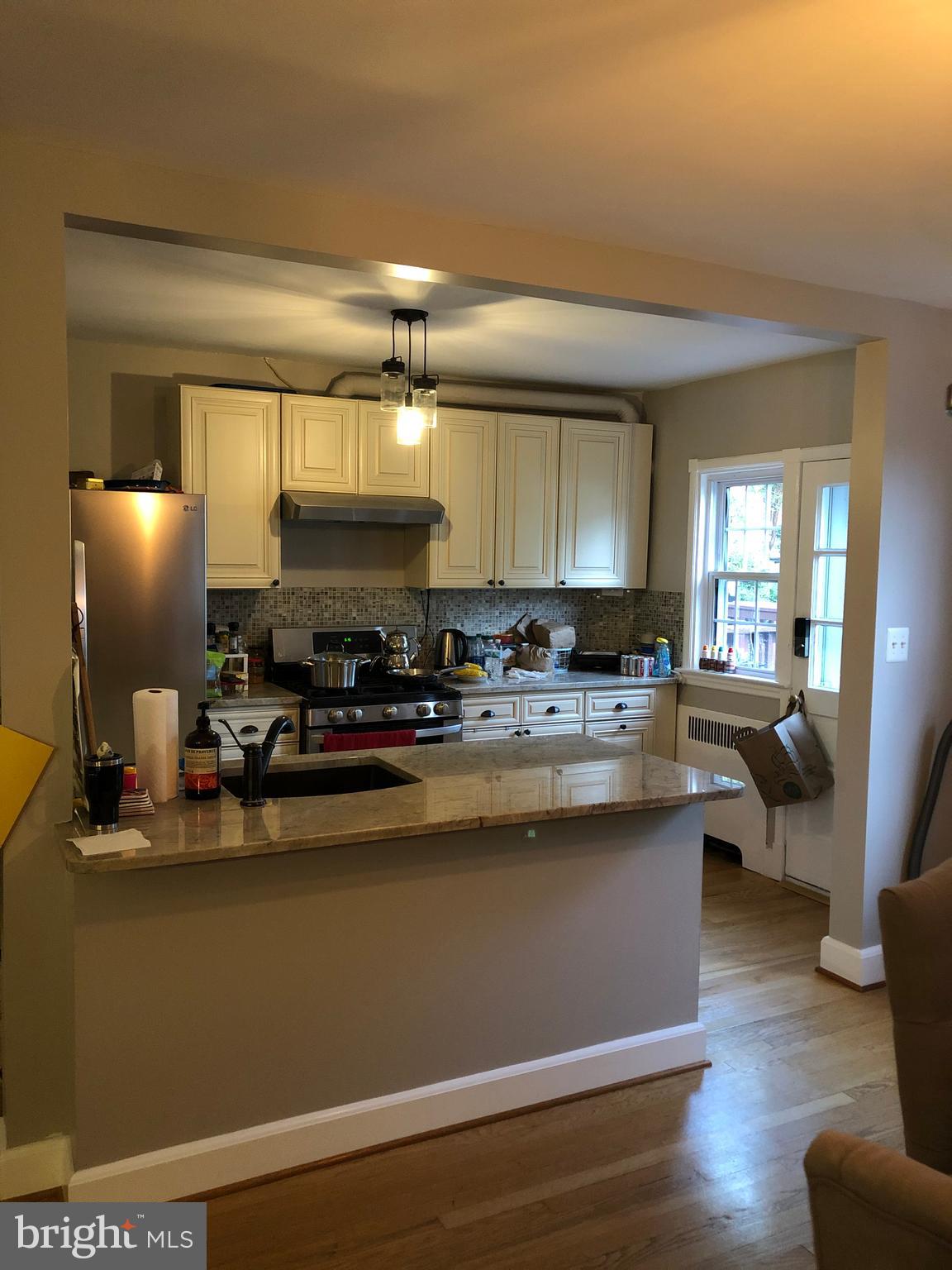 33 Murdock Road Baltimore, MD 21212 - Photo 4 of 11 Open Concept Kitchen with granite countertops and