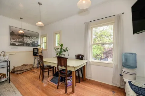 a kitchen with sink cabinets and window