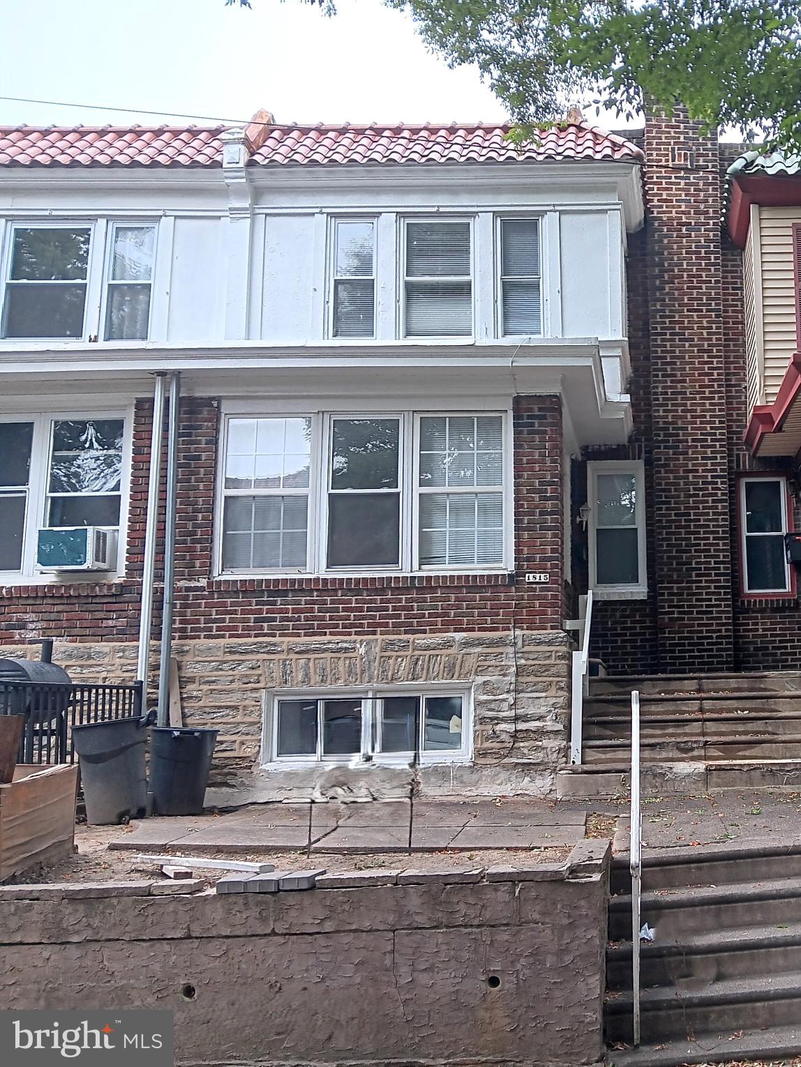 1815 Penfield Street Philadelphia, PA 19126 - Photo 1 of 11 a front view of a house with a road
