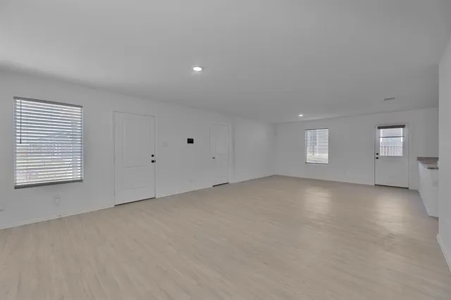 a front view of a house with parking space