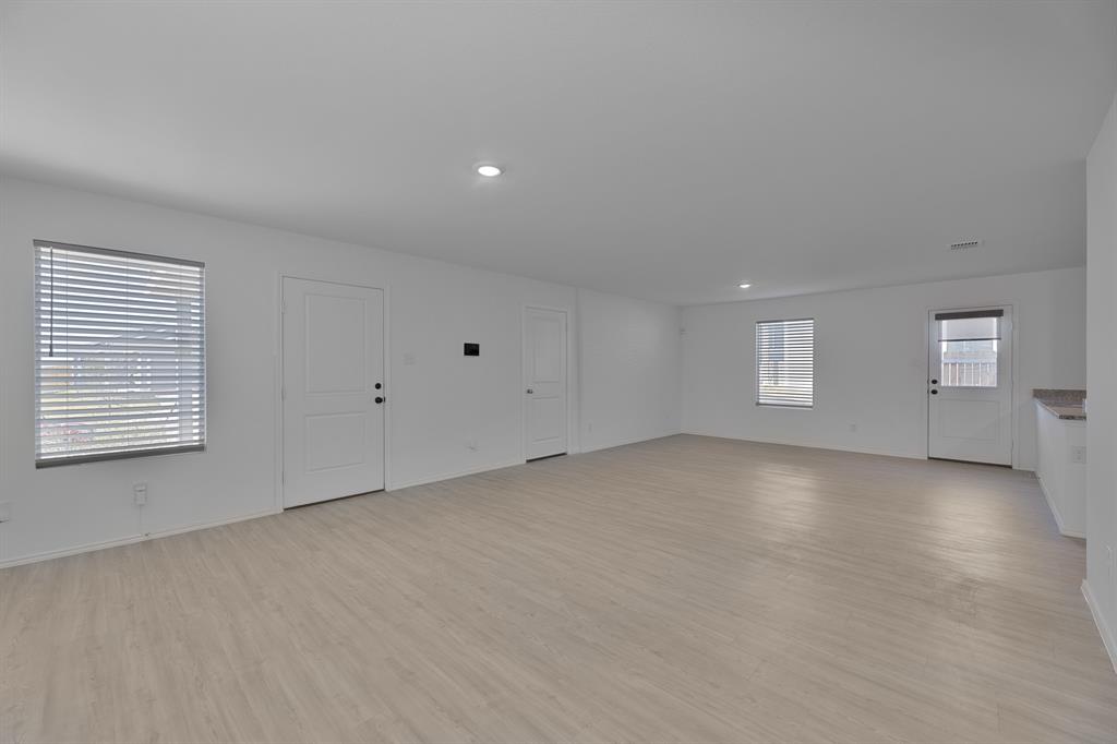 9752 Platteview Road Fort Worth, TX 76179 - Photo 10 of 25 a view of an empty room with a window