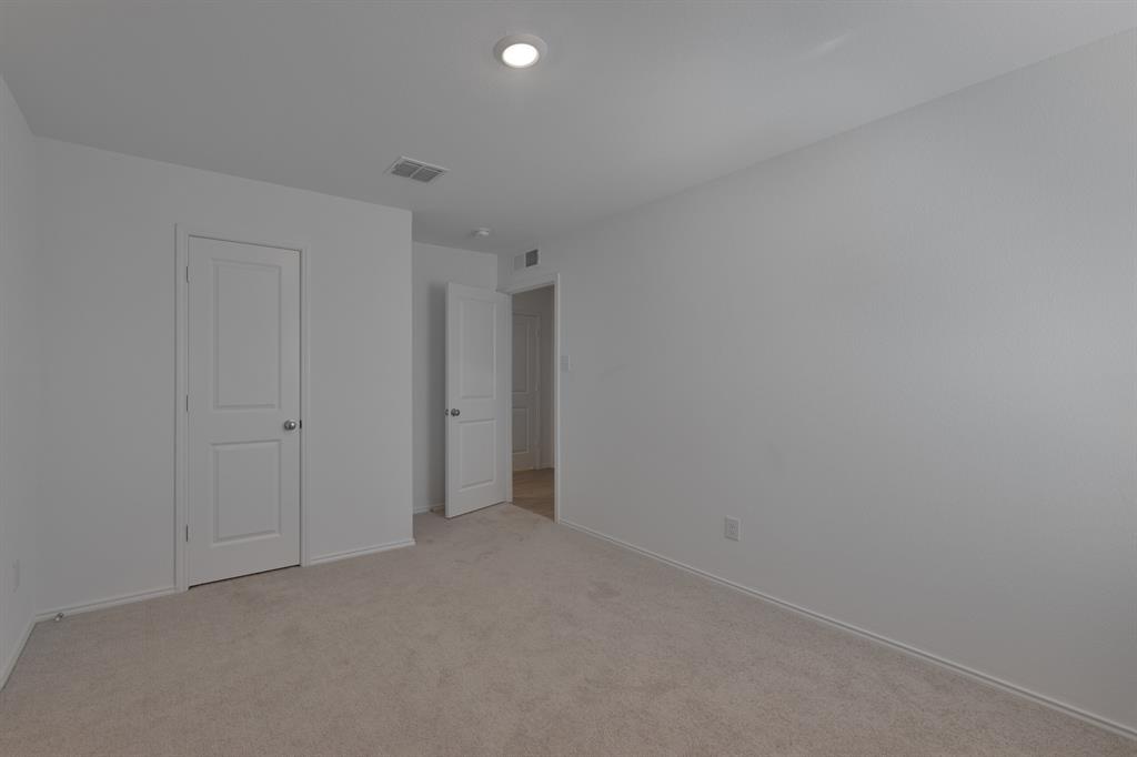 9752 Platteview Road Fort Worth, TX 76179 - Photo 22 of 25 a view of an empty room