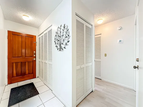 a view of entryway with stairs