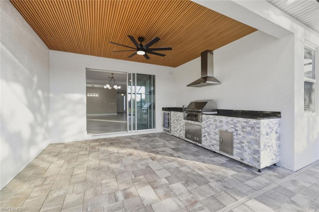 28049 Captiva Shell Loop Bonita Springs, FL 34135 - Photo 32 of 50 a large white bed in a white room